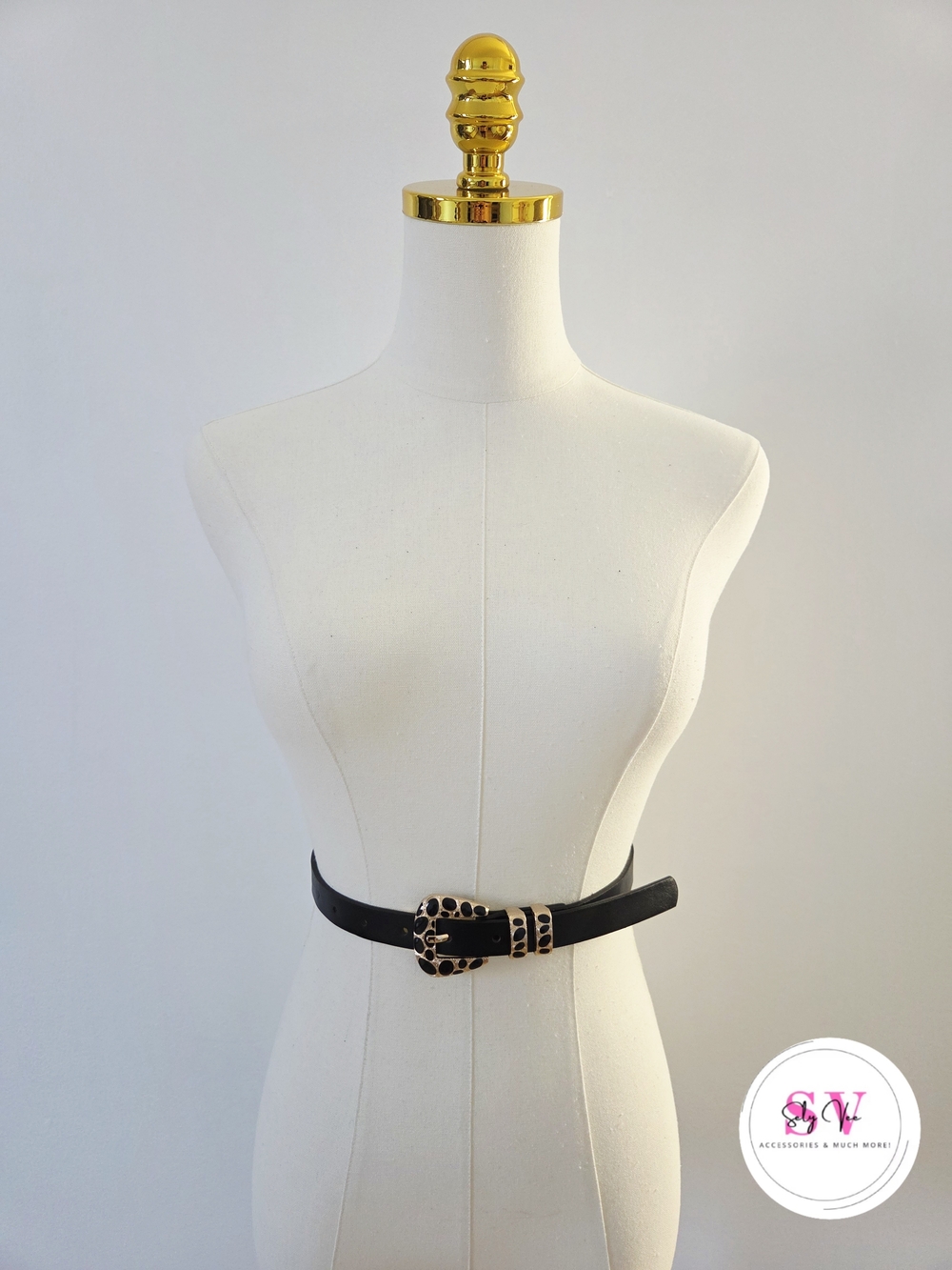 Black belt with gold leopard print buckle